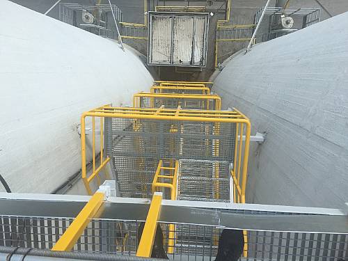 Repair of stairwell and protective barriers on reinforced concrete silos
